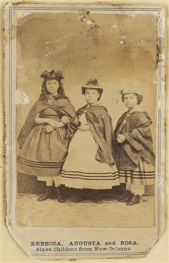 (SLAVERY) Group of 4 cartes-de-visite of girls purported to be indentured or emancipated slaves in New Orleans.